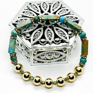NWOT  Handmade turquoise stretch bracelet with stainless steel gold plated
